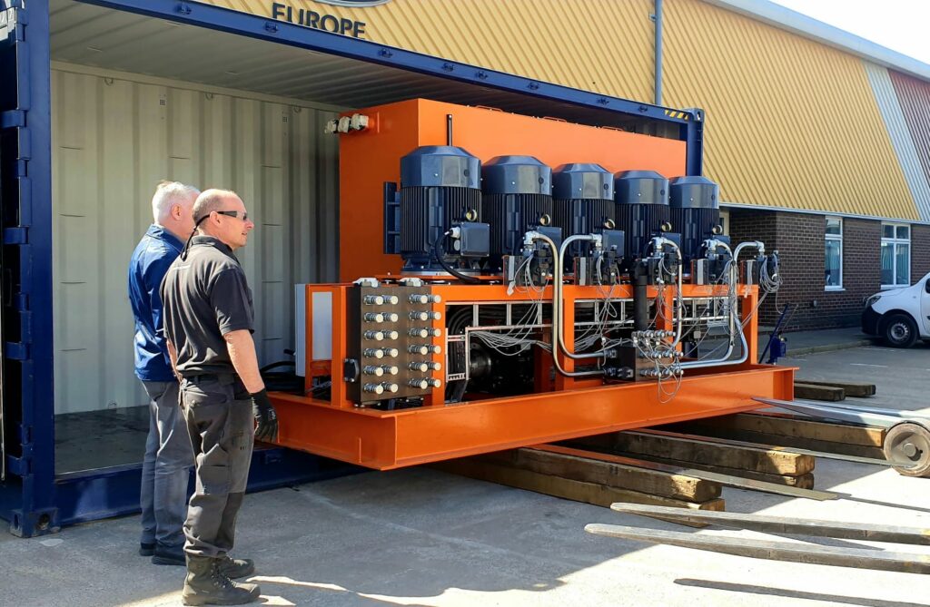 The Yuken Europe team with a specially designed hydraulic unit.